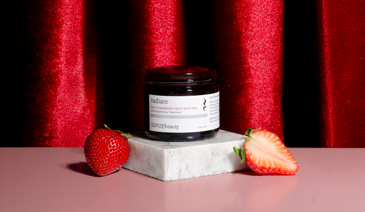 Wild Strawberry Peel with strawberry ice cubes on a white background