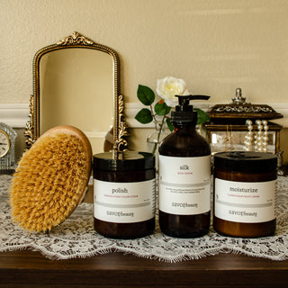 korean body ritual on a lace-draped surface with a mirror in the background.