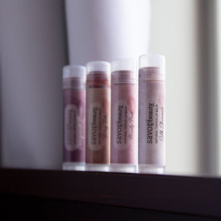 4 lip tints standing next to each other