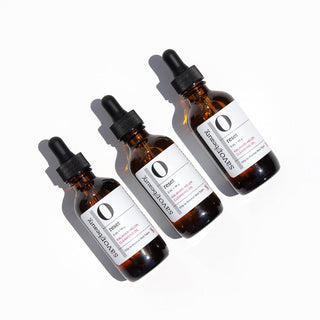 Three bottles of Kalahari cleansing oil in a row