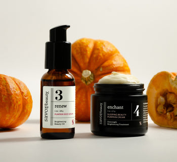 Savor Beauty Pumpkin Seed Serum + Sleeping Beauty Pumpkin Face Cream on a white background with pumpkins 