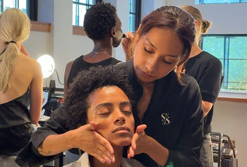 AKNVAS  new york fashio week behing the scenes, model getting a savor beauty facial