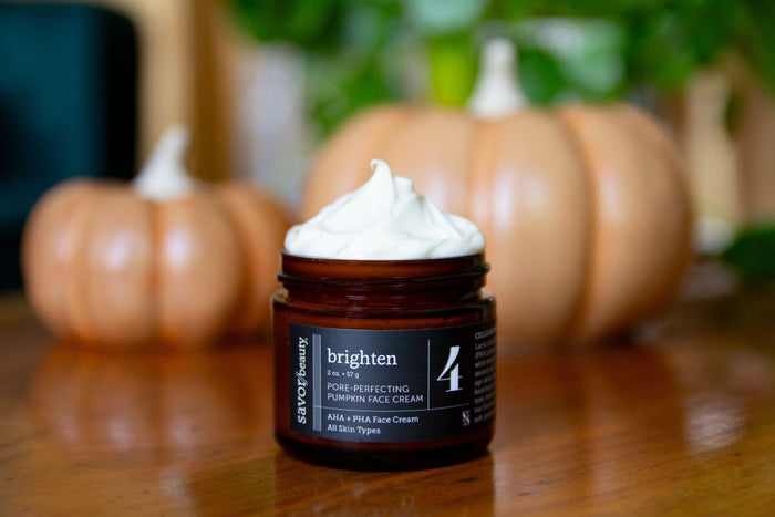 moody fall image of Pumpkin AHA PHA Face Cream , pumpkins are visible in the backround