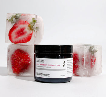 Wild Strawberry Peel with strawberry ice cubes on a white background