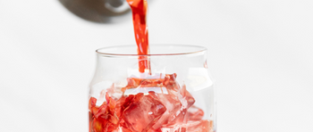 hibisus tea being poured over ice
