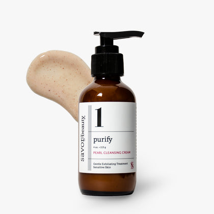 Savor beauty Purify Pearl Cleansing Cream in an amber glass pump bottle with a black dispenser, shown against a light gray background with a beige cream smear behind it.