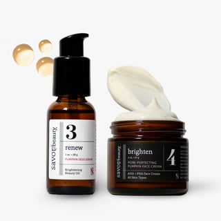 Two Savor Beauty skincare products on a light gray background: an amber bottle of Renew Brightening Beauty Oil with a black pump, and an open amber jar of Brighten Pumpkin Face Cream with cream visible on top. The products are arranged side by side with a few translucent droplets floating near the bottle.