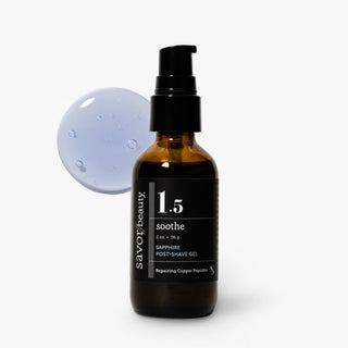 A bottle of Savor Beauty 1.5 Soothe Post-Shave Gel in an amber glass bottle with a black pump and black label, shown on a light gray background with a translucent blue gel droplet graphic behind it.