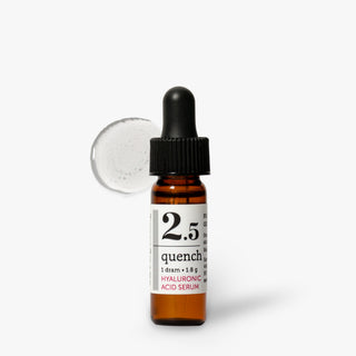 A small savor beauty amber glass dropper bottle labeled '2.5 quench' with a black dropper cap, shown on a clean white background with a translucent gel swatch behind it.