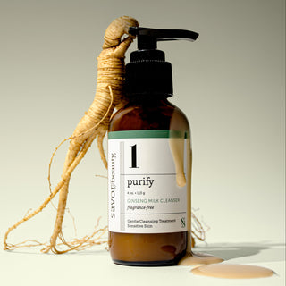 Ginseng root resting on an amber skincare bottle labeled 'purify' on a neutral background