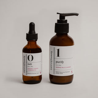 Two brown bottles with labels on a light gray background