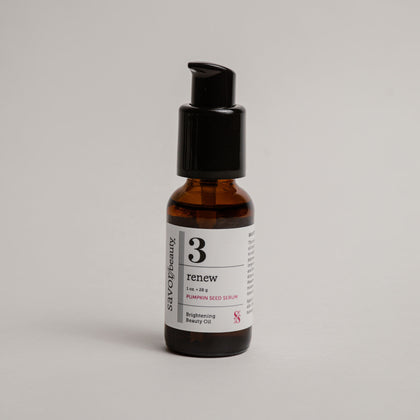 Skincare serum bottle labeled '3 renew' on a gray background