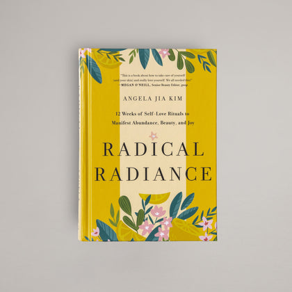 Book titled 'Radical Radiance' with yellow floral design on a gray background