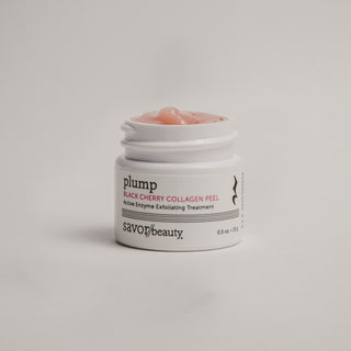 Jar of 'plump' black cherry collagen peel on a light gray background