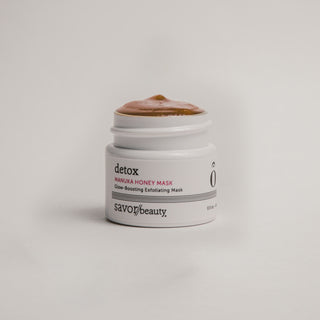 white jar of skincare honey mask