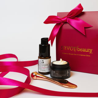 Savor Beauty skincare products with a red box and ribbon on a white background