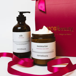 Savoy Beauty skincare products with a red gift box and ribbons on a white background