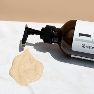 zoomed in shot of pearl cleanser pump with texture of the product 